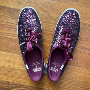 Maroon Sparkly Keds for Kate Spade with a ribbon tie. Size 8.5